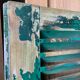 Old green shutter blinds