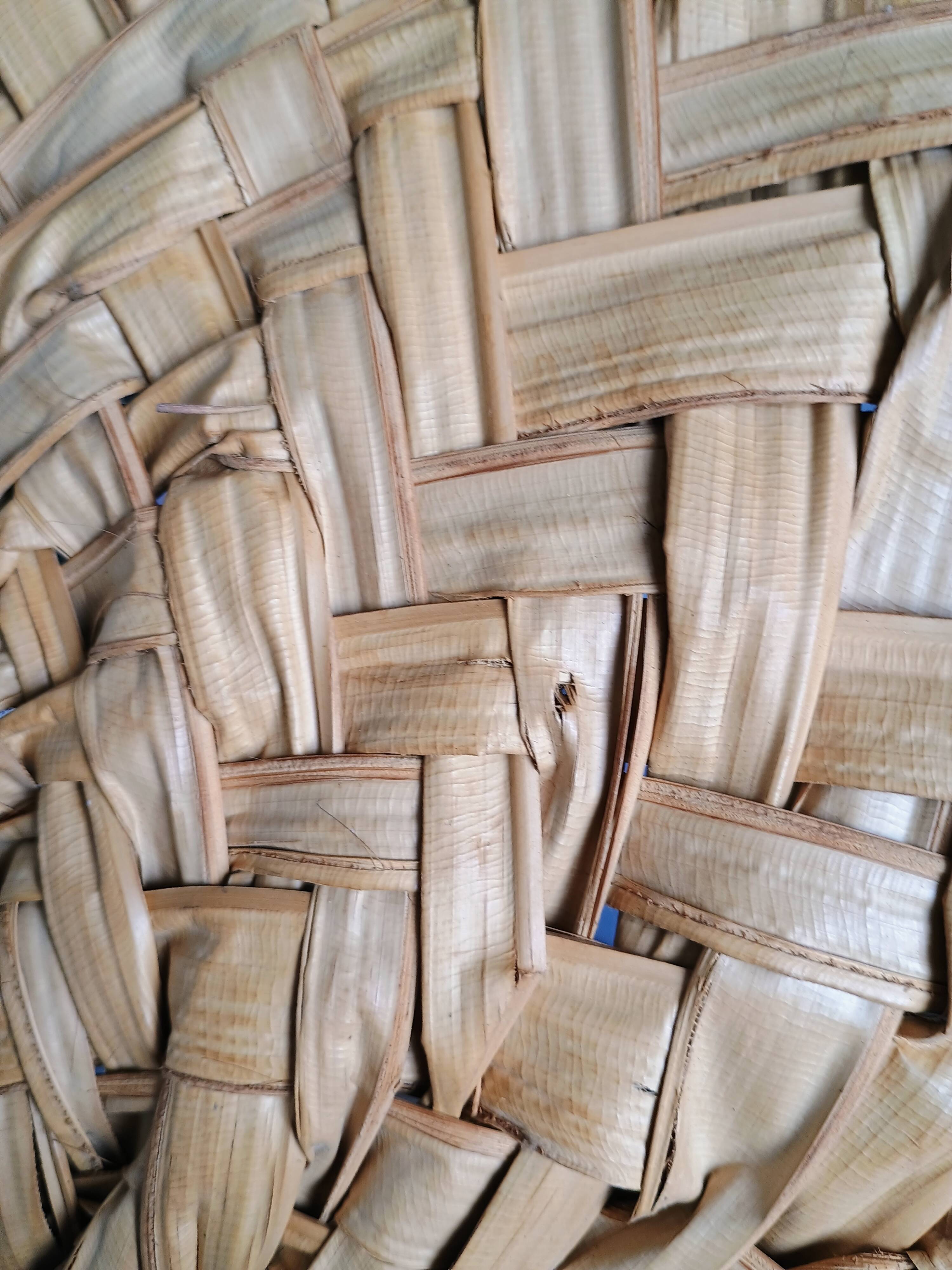 Heart fan in vintage woven palm leaves