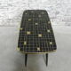 Vintage coffee table with glass top