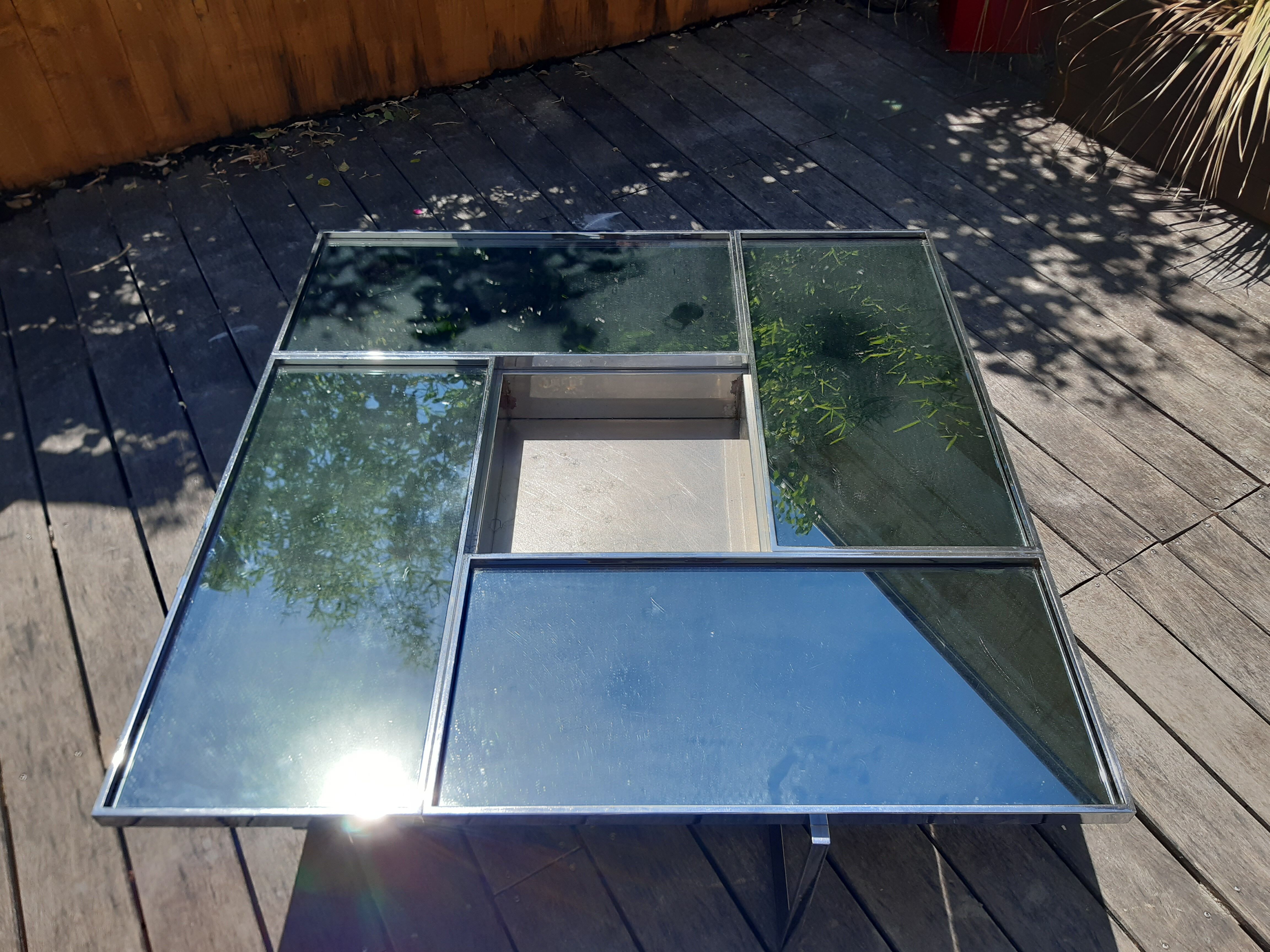 Chrome metal coffee table and mirrors