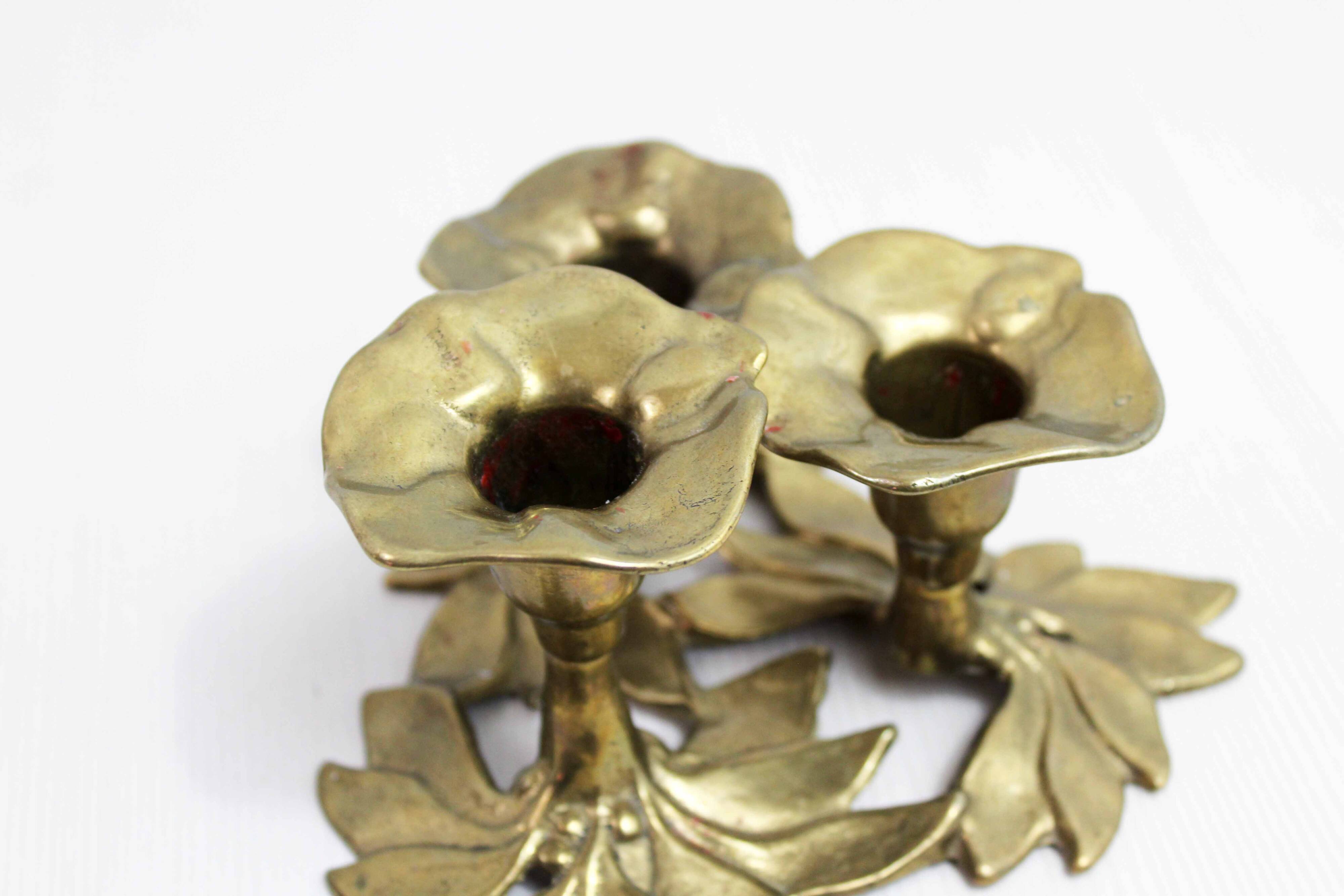 Brass flower candle holder