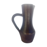 Long pitcher in varnished sandstone