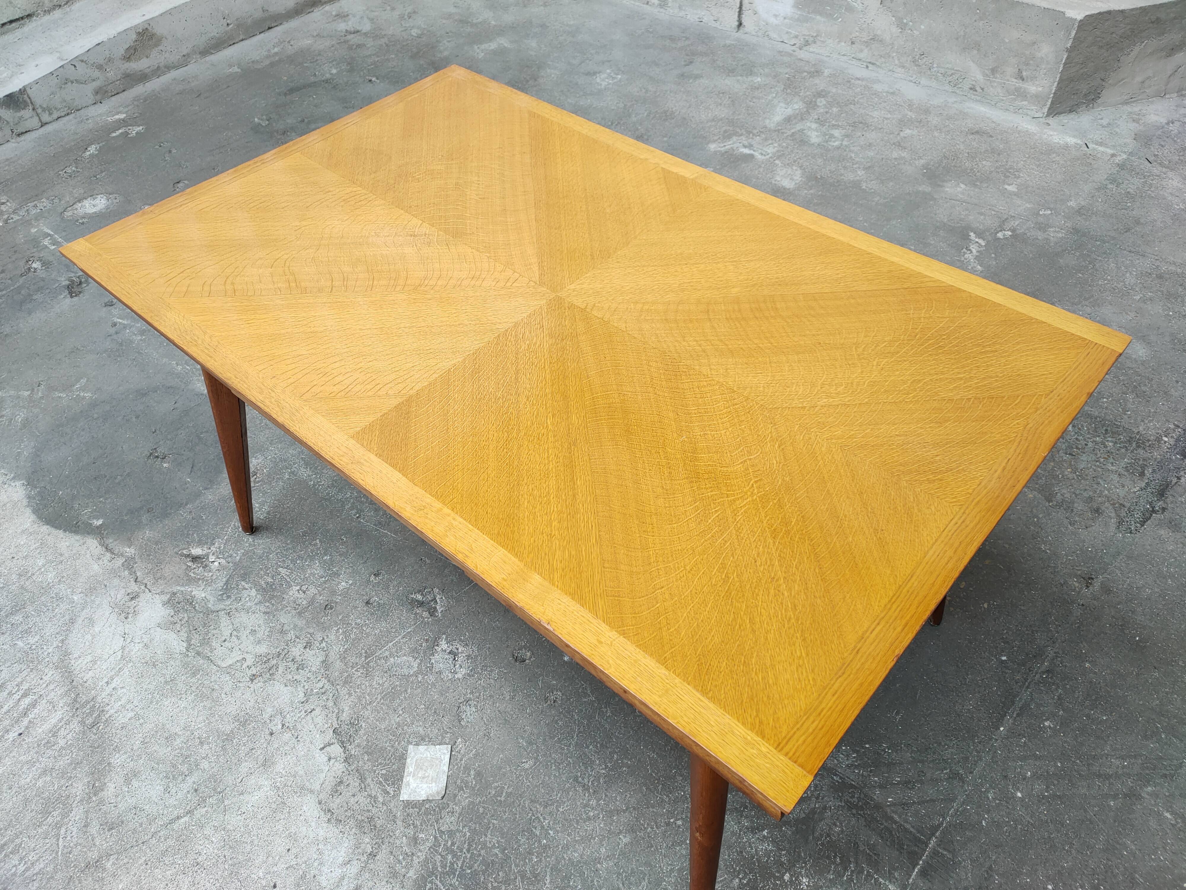 Dining table with oak compass legs