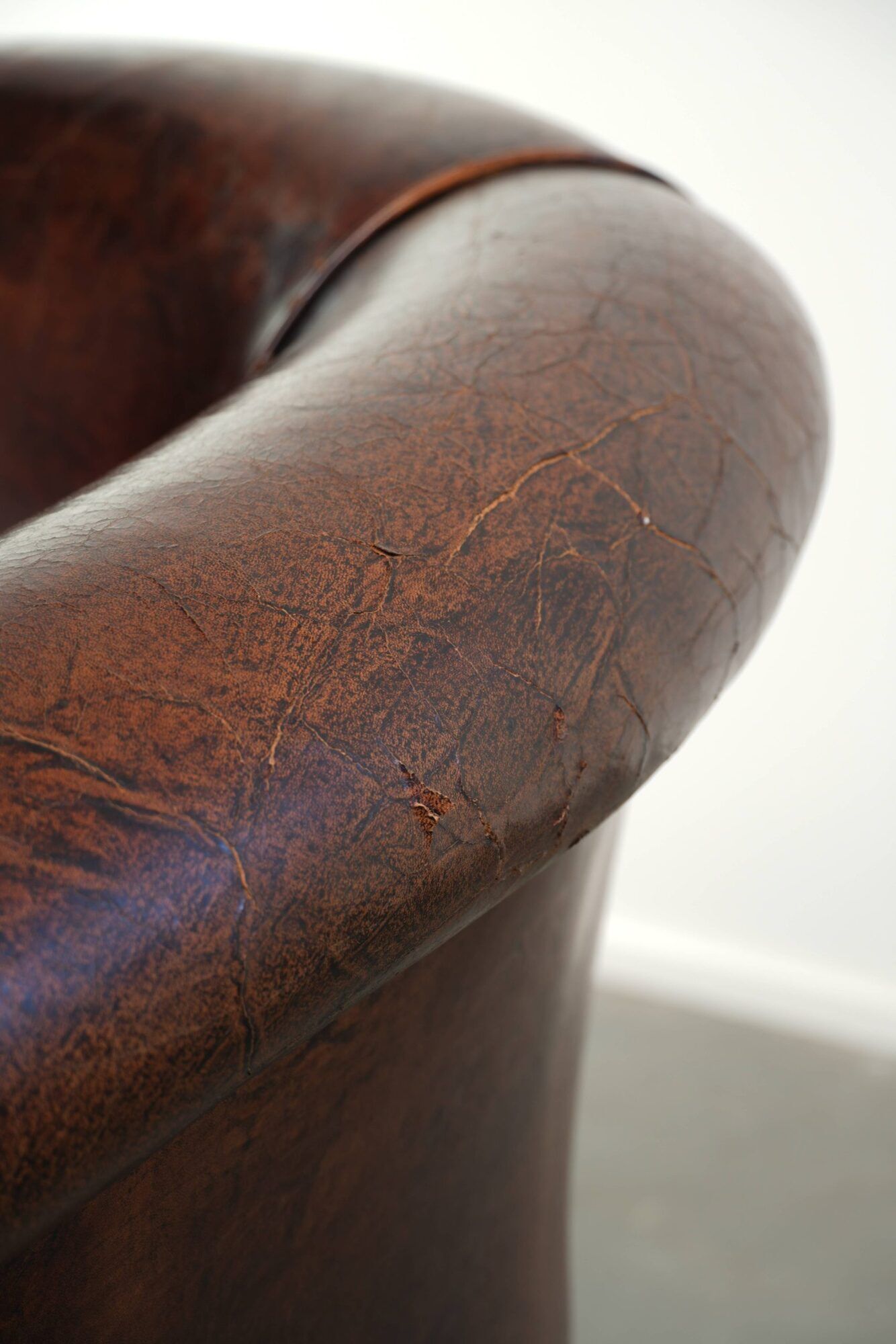 Vintage sheepskin club armchair with beautiful colours and a subtle size