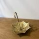 Brass pocket emptier