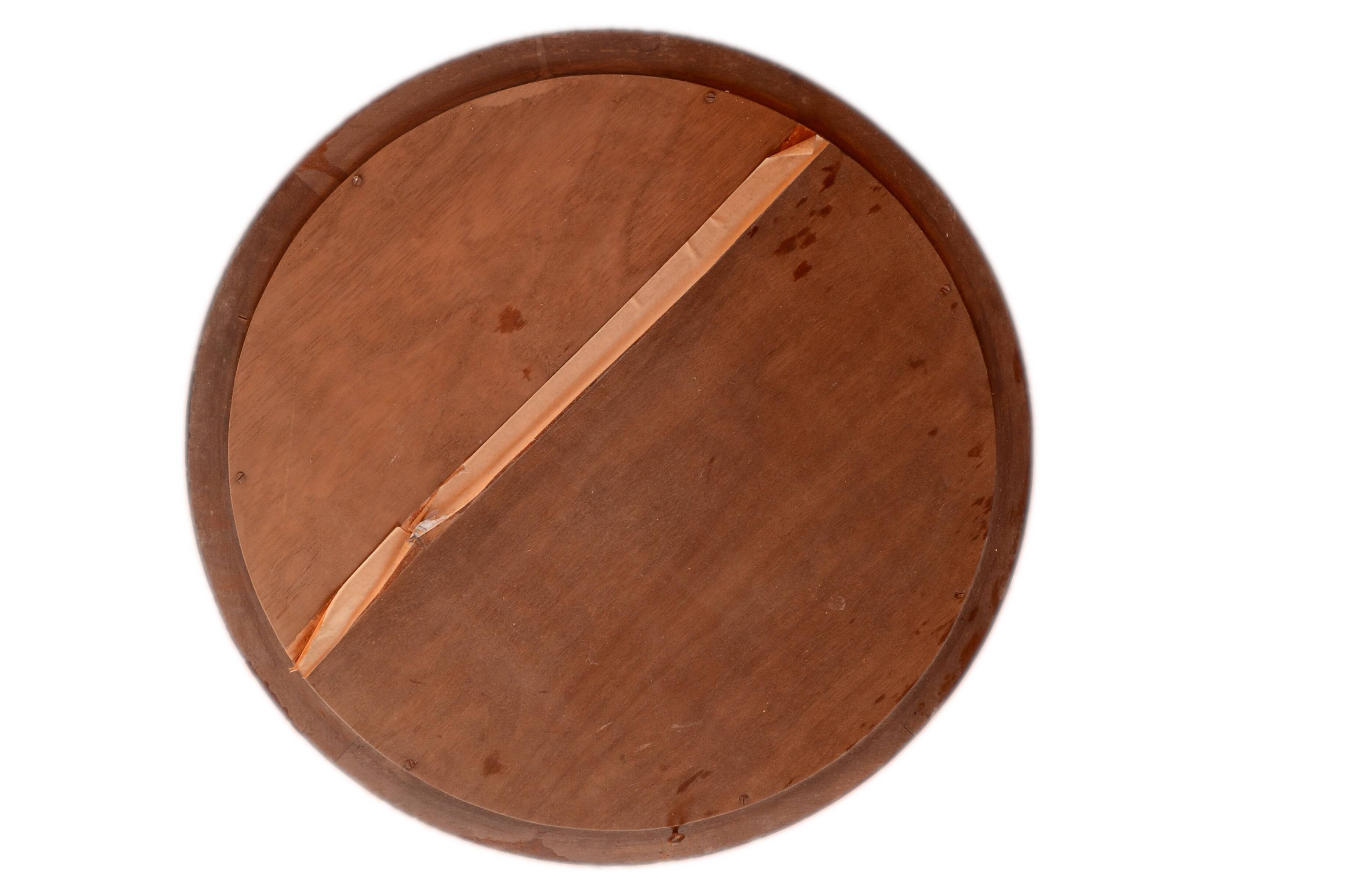 Round mirror in solid oak, bevelled, damaged, diameter 56cm.