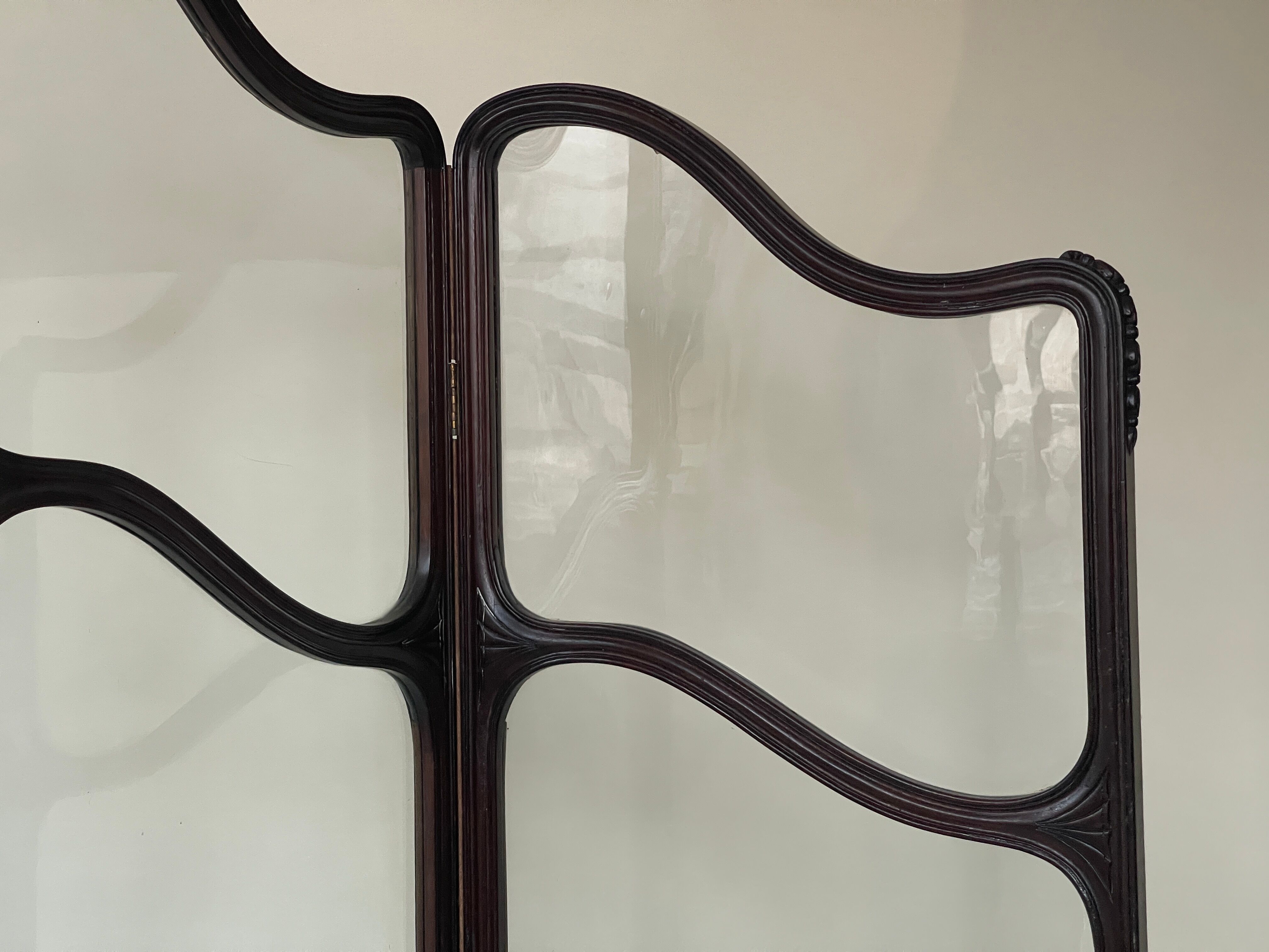 Art nouveau mahogany and glass concertina screen