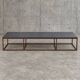 Weighty coffee table with solid iron frame and stone slate table tops, made on commission by architect Alex Vervoordt, Belgium 1990s