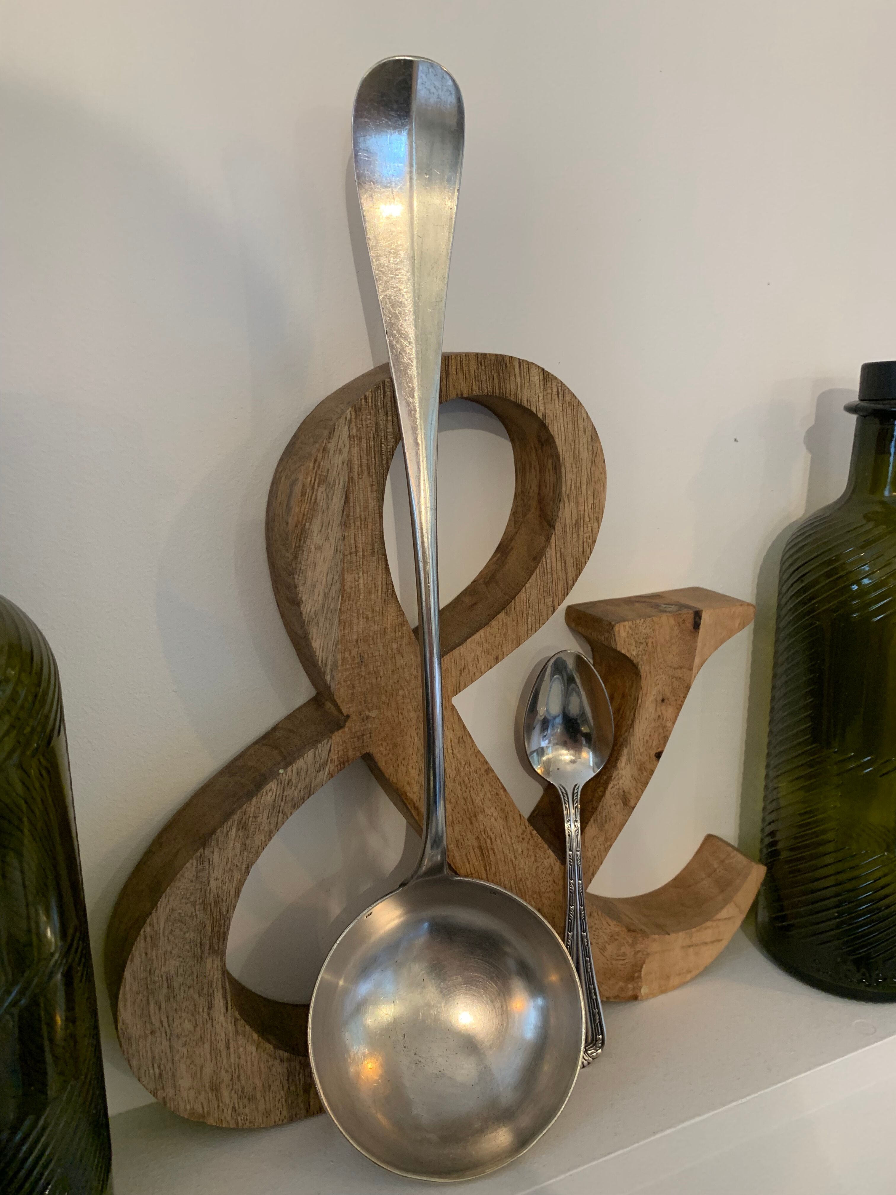 1 ladle and 1 spoon in silver