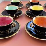 set of 9 black and gold Salins cups and saucers