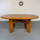 Extendable round table Maison Regain in solid elm, 1970s design.