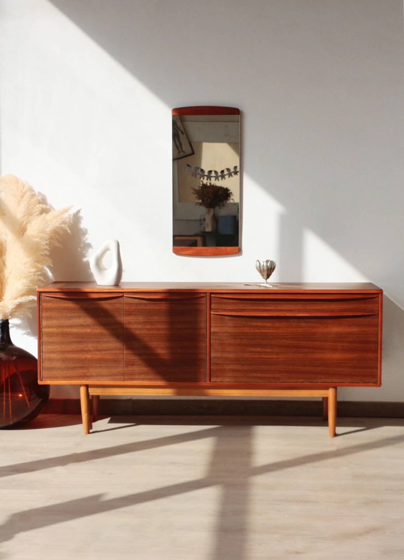 Vintage zebrano and walnut furniture from Morris of Glasgow.