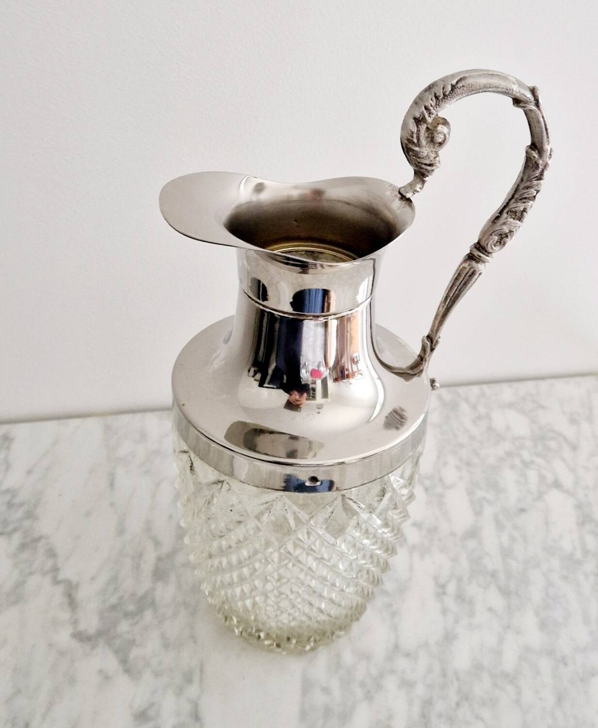 Glass and silver-plated carafe