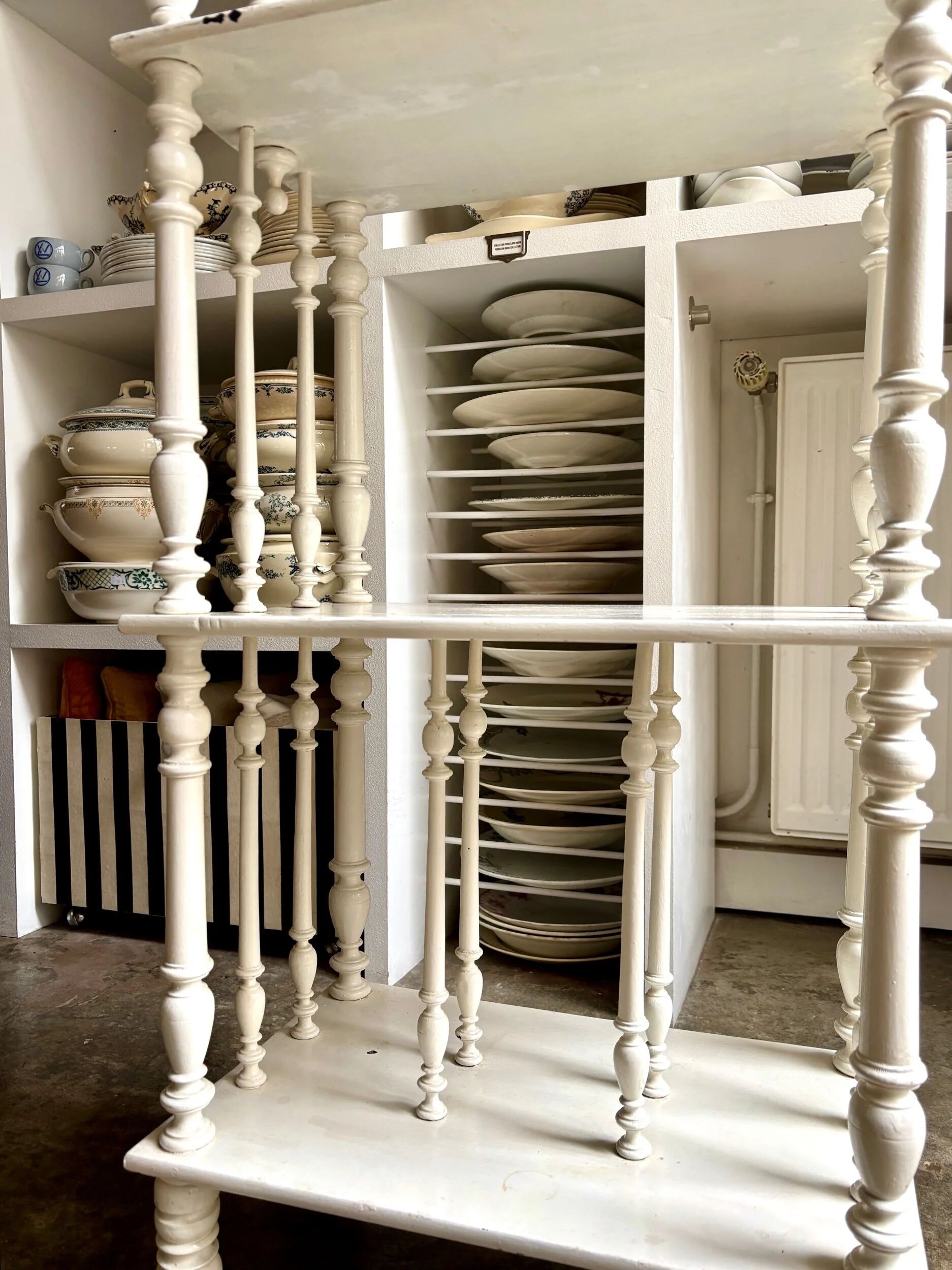 Library, white wooden sheet music cabinet.