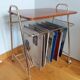 Serving table for storing vinyl records, magazine holder