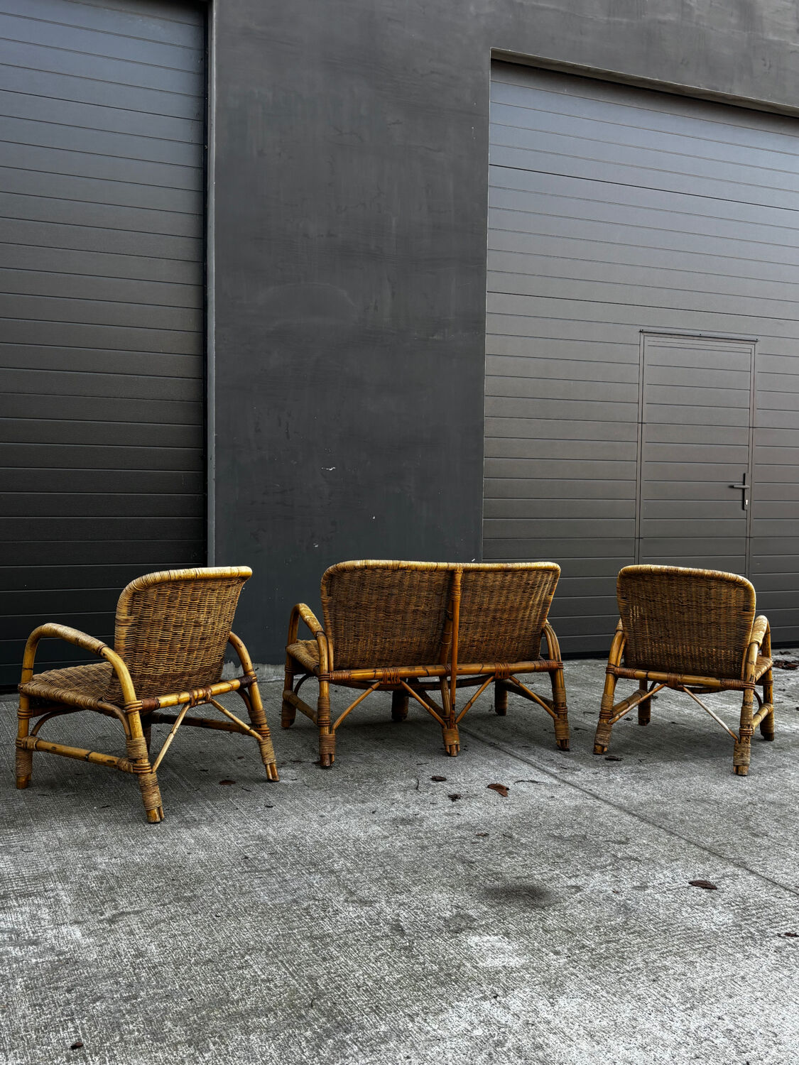 Vintage rattan garden furniture – complete set with sofa and armchairs.