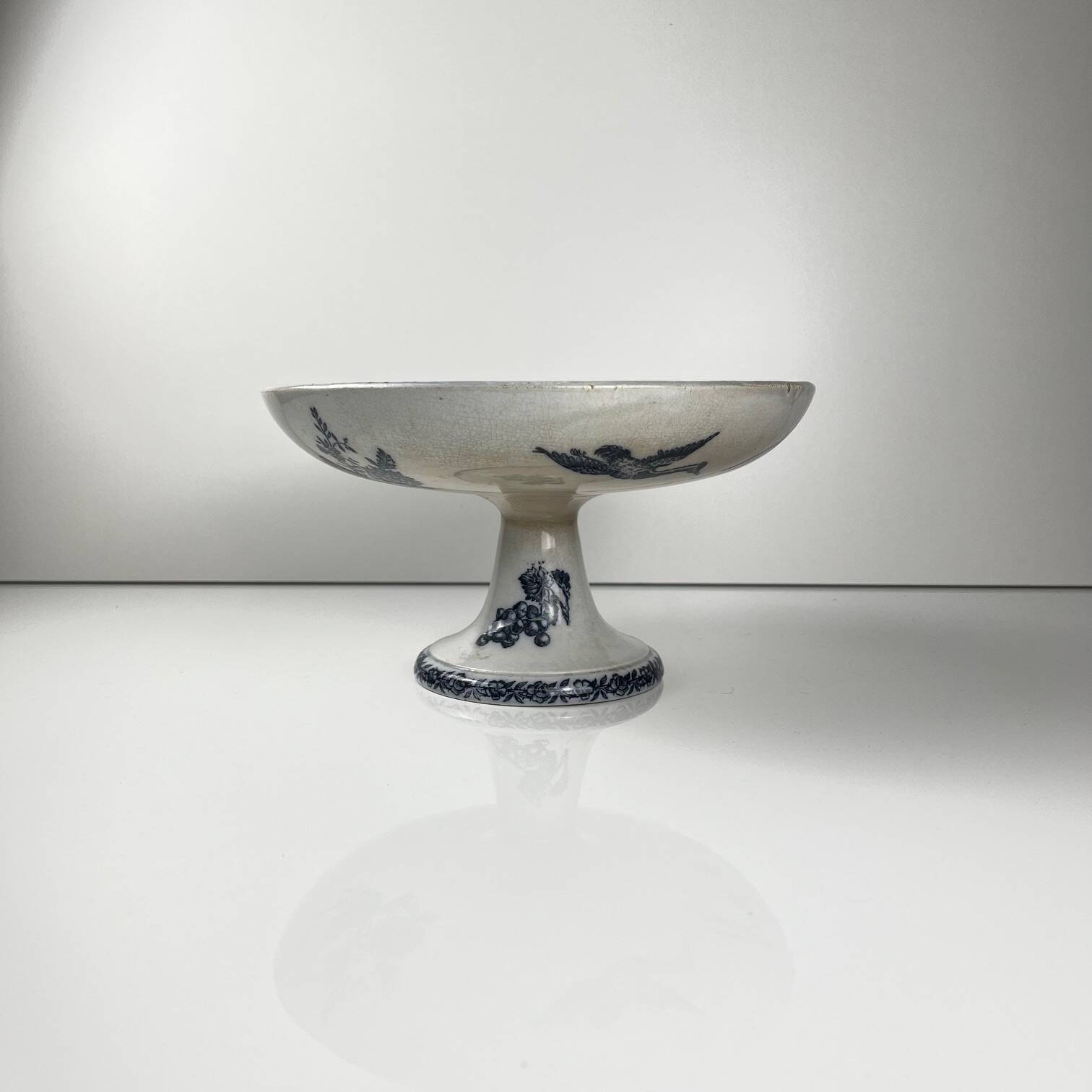 Pexonne iron earth compote dish, blue bird motif, late 19th century