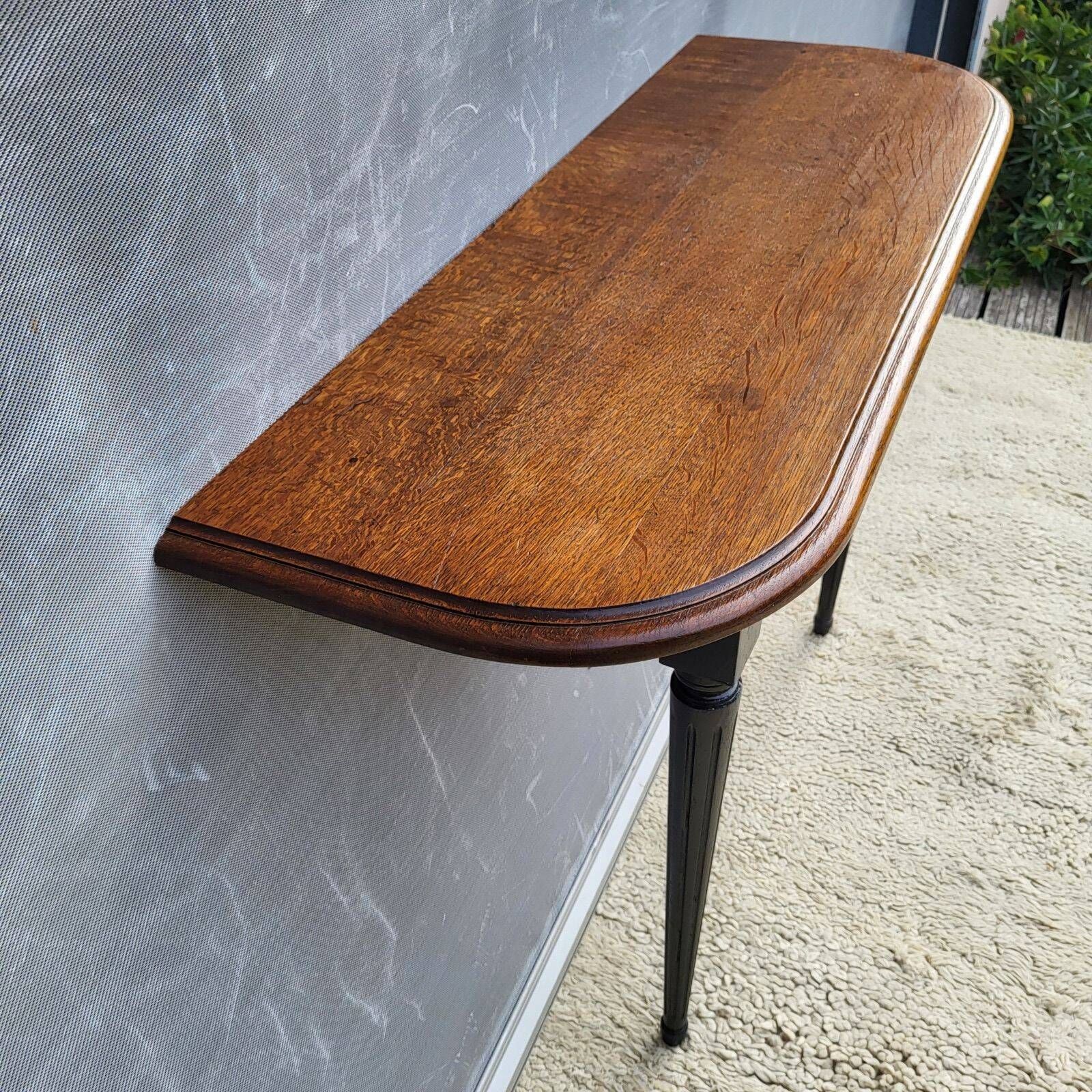 Console bicolore noire et chêne style Louis XVI restaurée