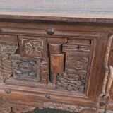 Old wooden console with chains