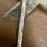 Brutalist candlestick in struck steel