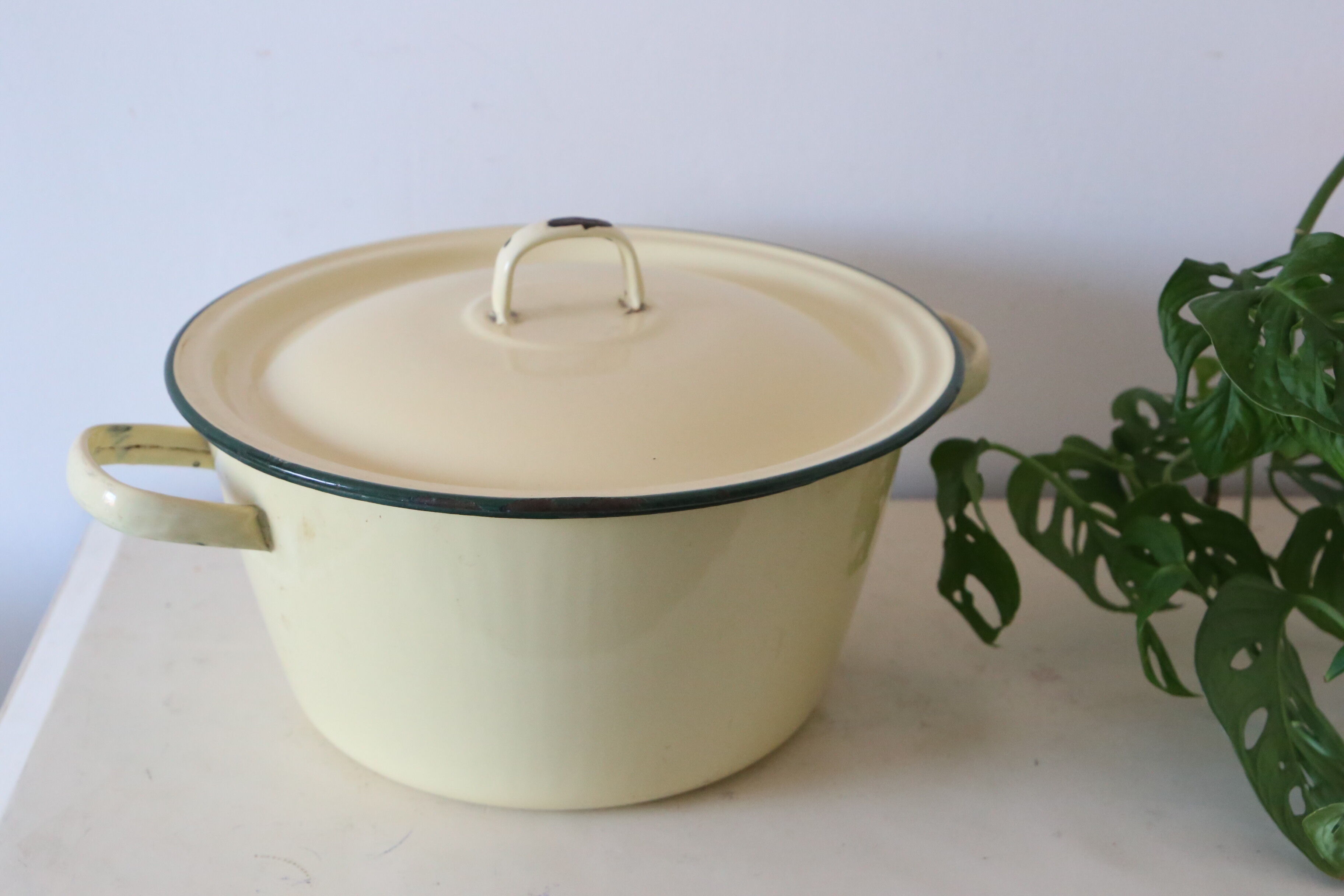 Enamelled metal marmite, pale yellow, vintage