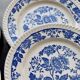6 vintage white porcelain dinner plates with a blue floral pattern