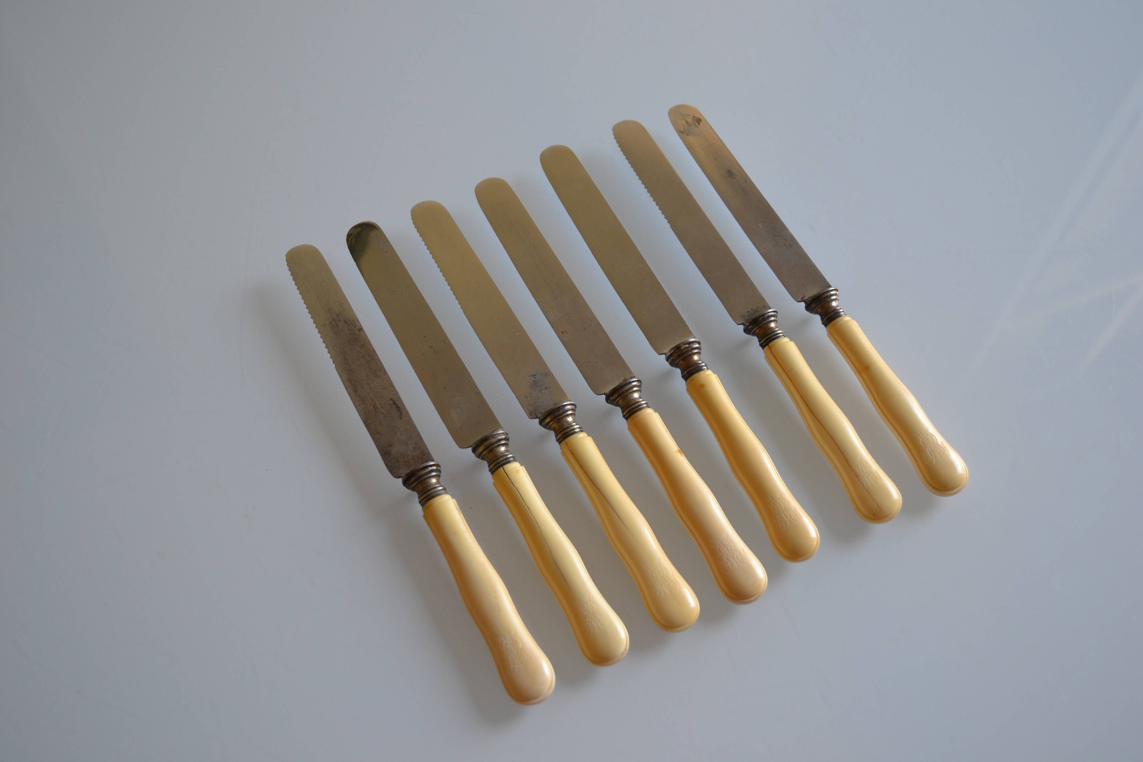 7 old table knives from the 19th century, monogrammed ivory-colored handles