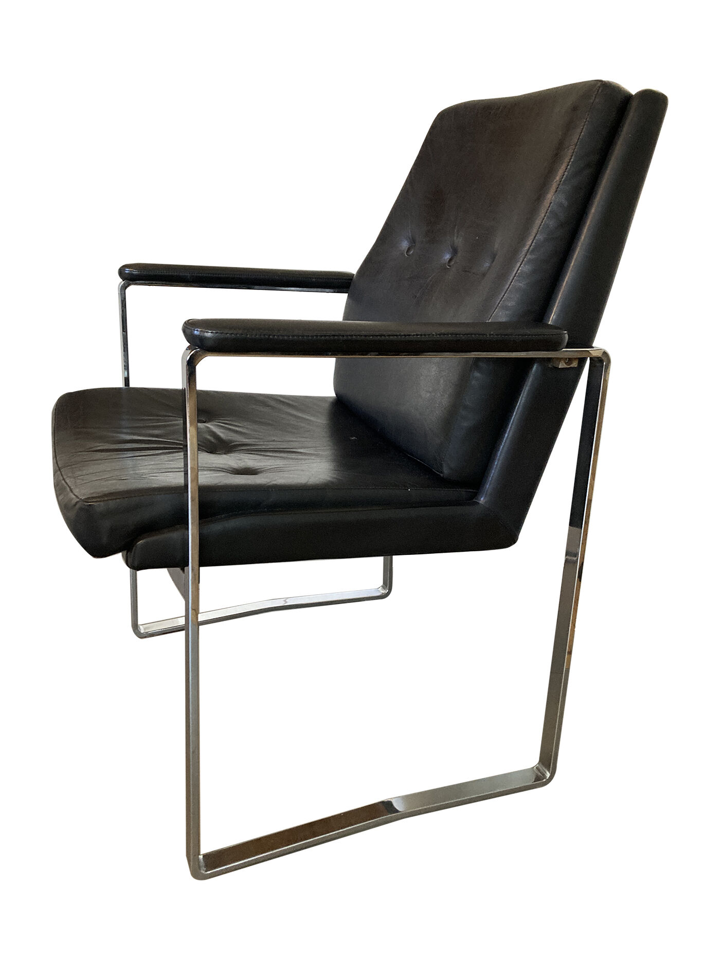 Armchair, office chair. Leather and chrome-plated steel. 1980