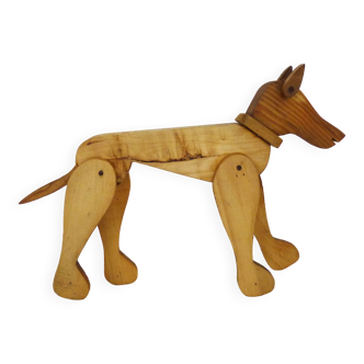 Articulated wooden dog toy. 1940s