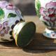 Two small vintage cloisonné enamel vases with Asian floral decoration.
