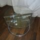 Glass coffee table with swivel tops circa 1980