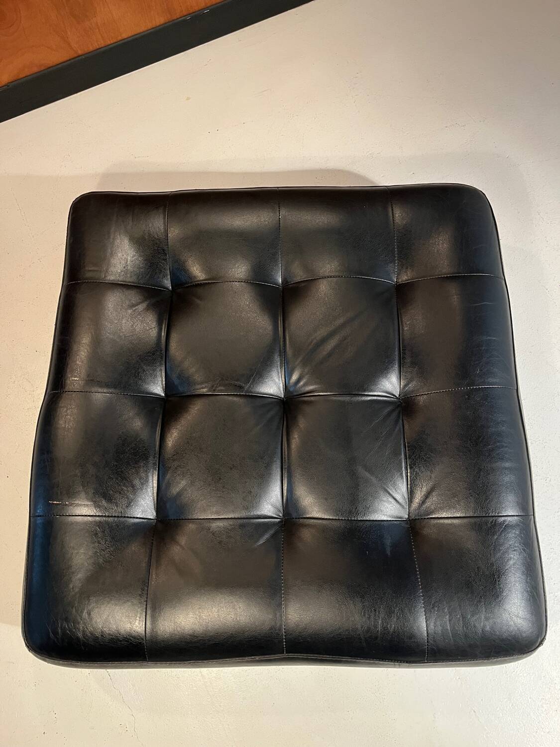 Leather poufs from Roche Bobois around 2000.
