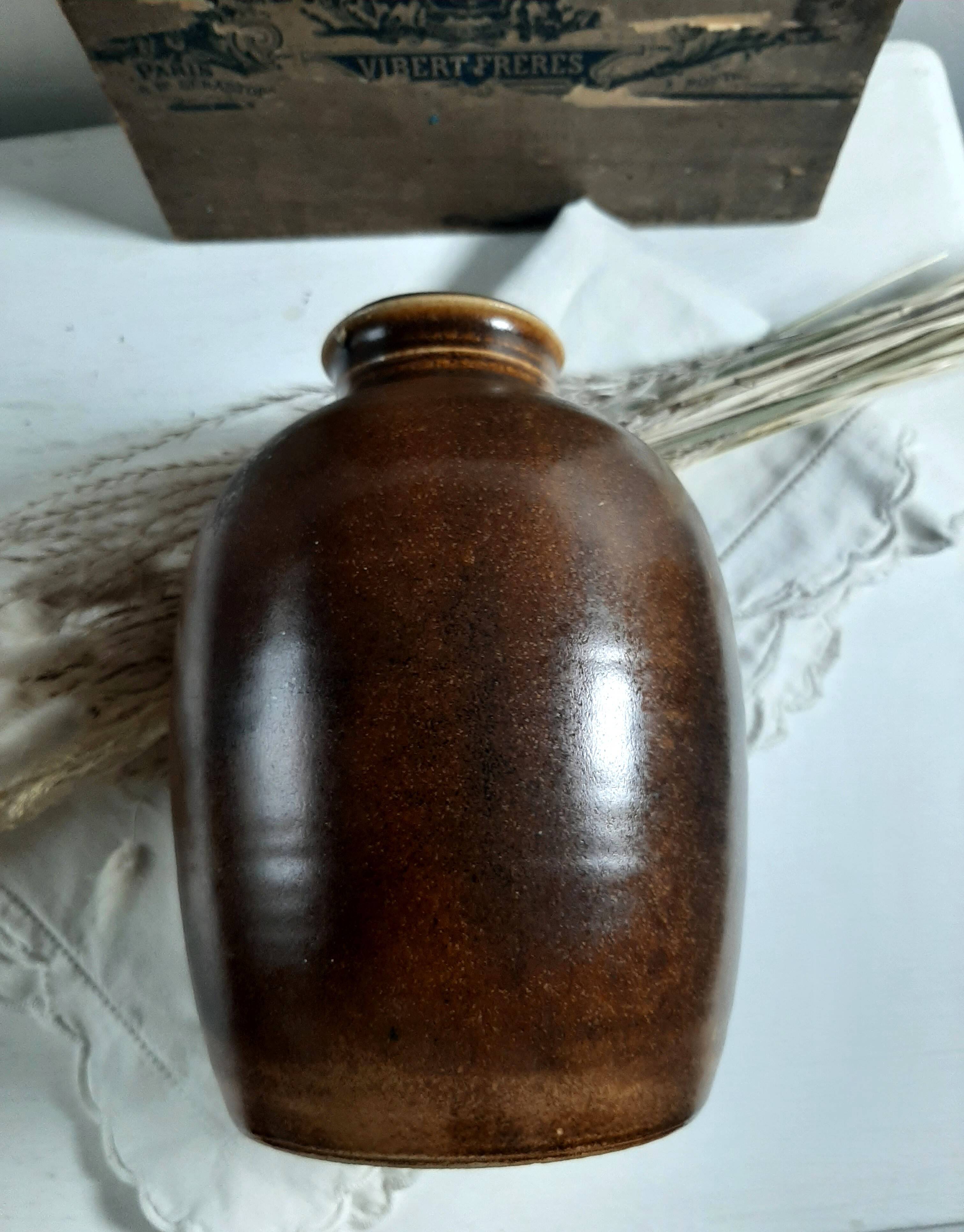 Brown vase signed Barotte