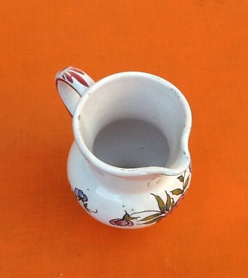 Milk jug XIXth polychrome ceramic floral decoration