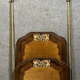 Art Nouveau period bed in painted iron faux wood with stylized colored patterns
