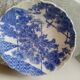Asian earthenware dish with floral and bird decoration