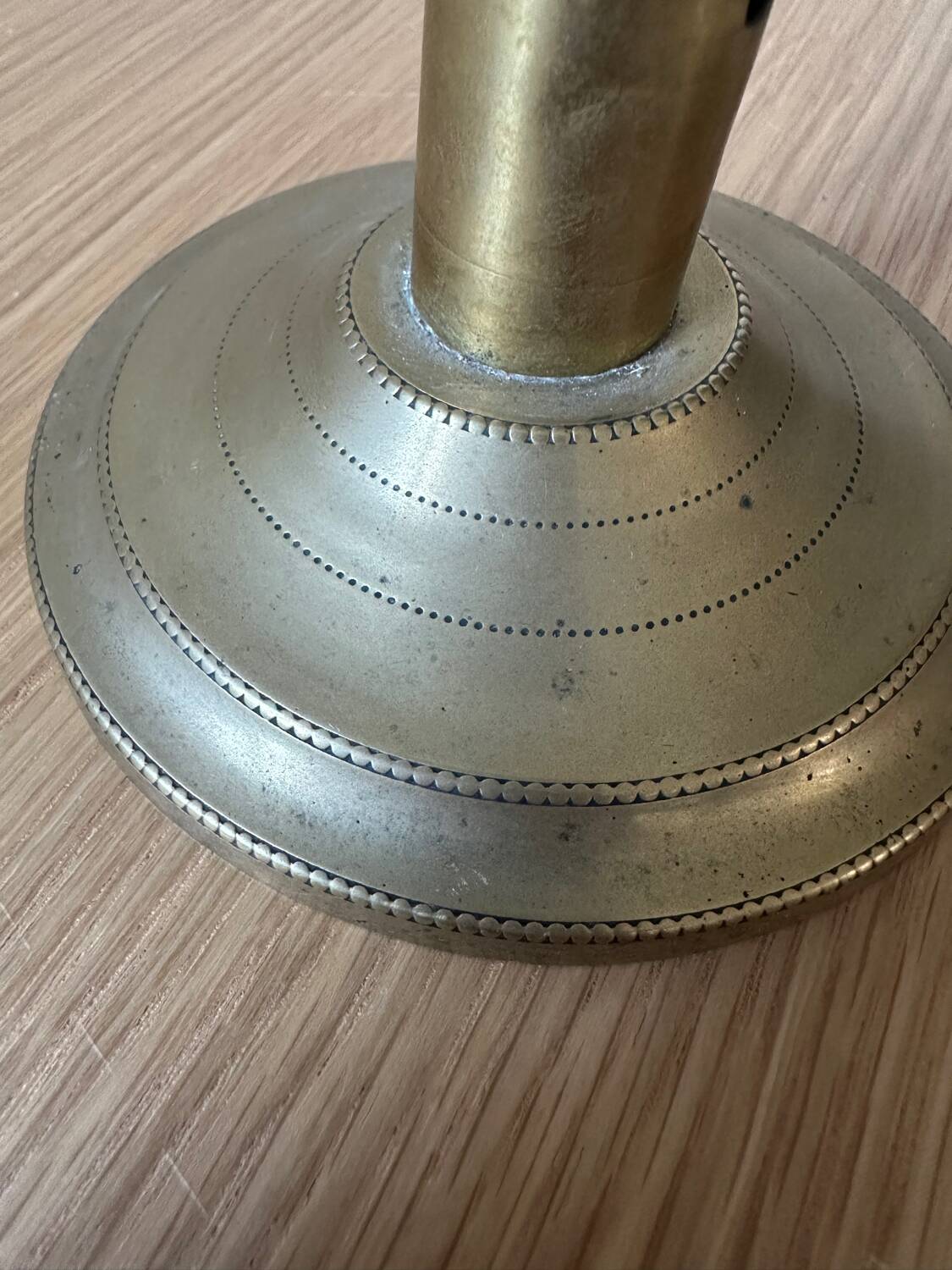 Old brass pull candle holder