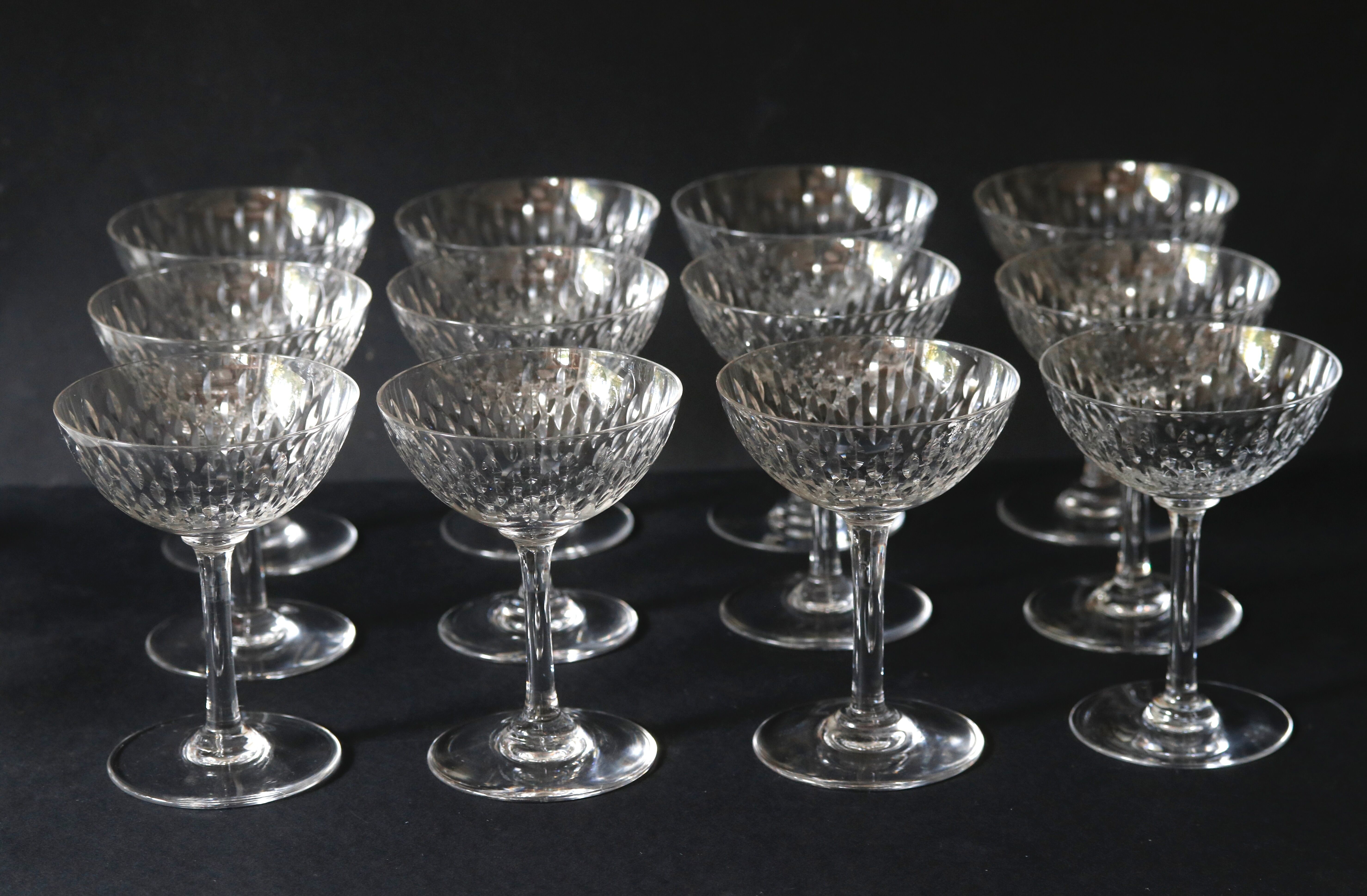 Suite of 12 champagne glasses in Baccarat crystal. Model Paris