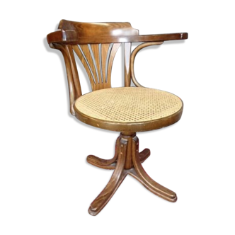 Fauteuil de bureau en bois courbé pivotant assise cannée