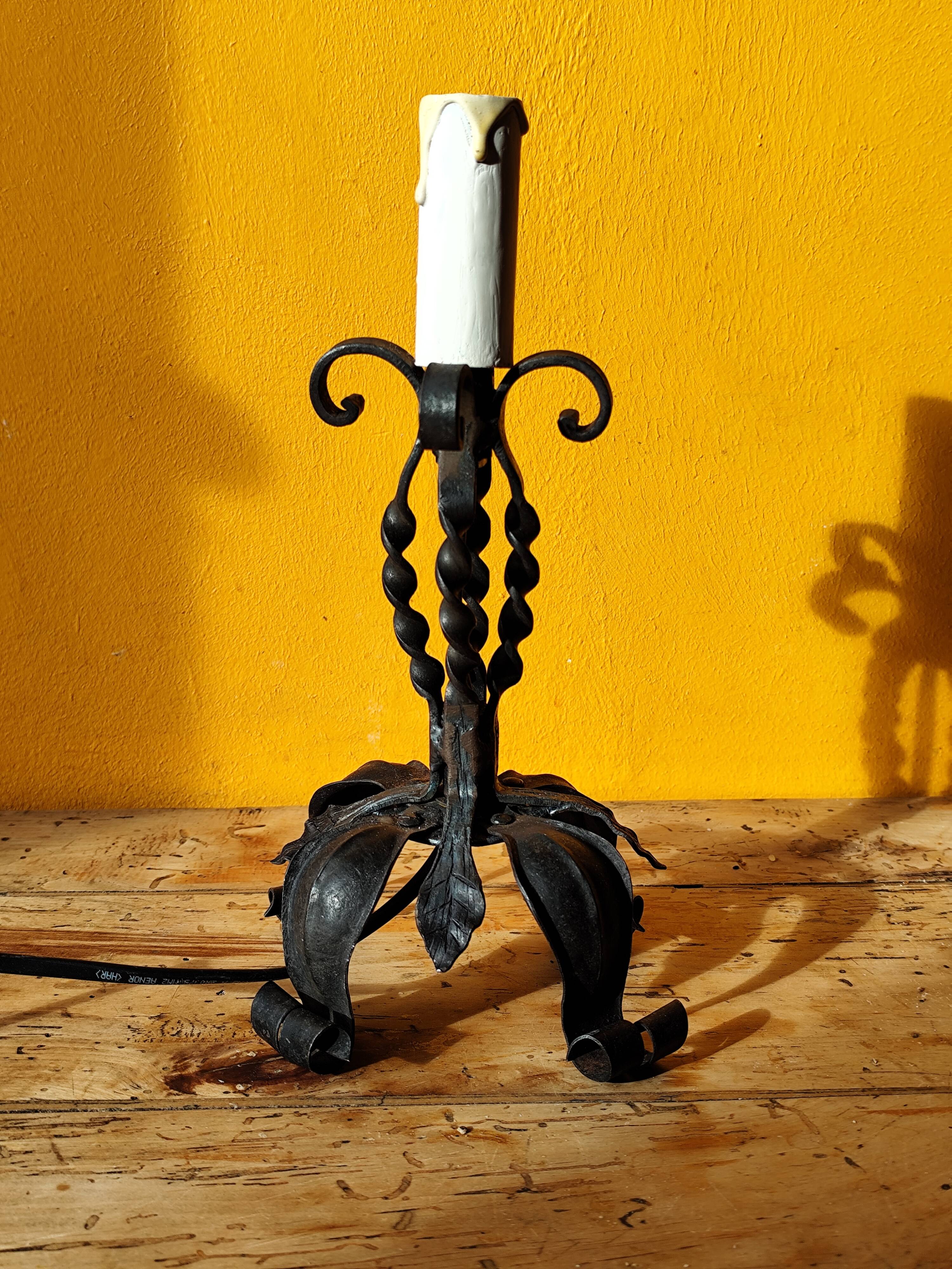 Old metal lamp and fake candle