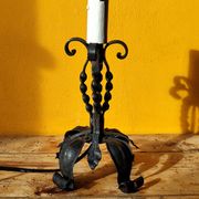 Old metal lamp and fake candle