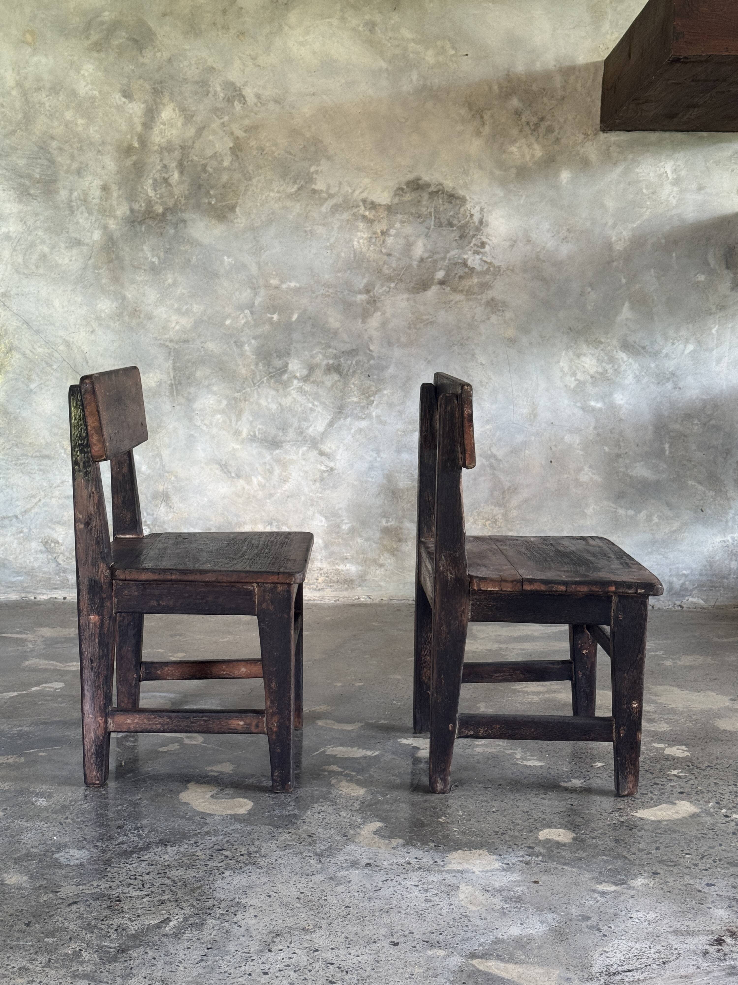 Small antique Indonesian children's chair in teak.