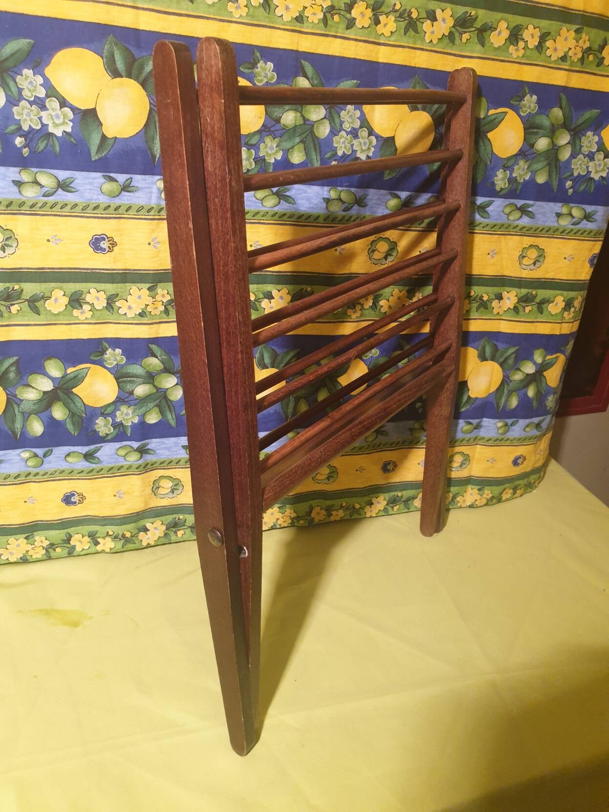 Scandinavian wooden folding magazine rack