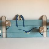 Coat rack with vintage swallows