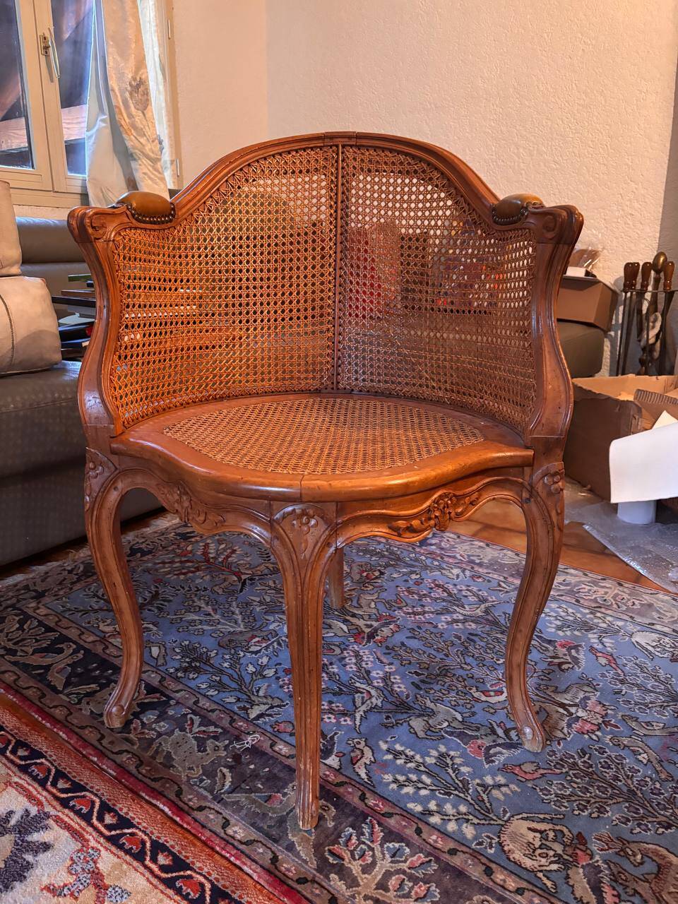 Louis XV style caned armchair