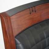 Art Deco design armchair with black leather with decorative stitching