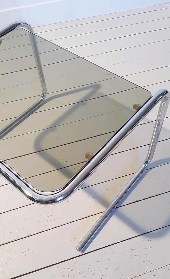 Smoked glass and chrome metal sofa tip
