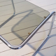 Smoked glass and chrome metal sofa tip