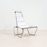 A pair of low chairs. France 70s