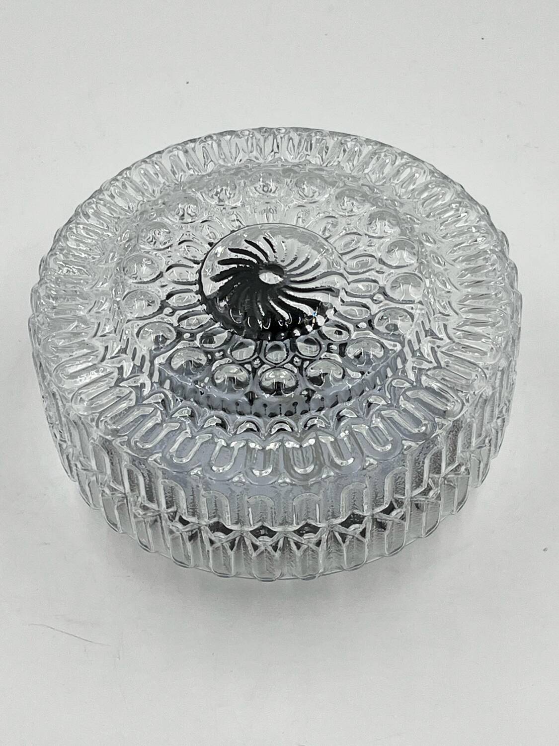Molded glass ceiling light with relief